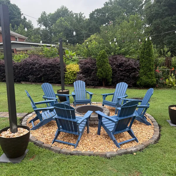 Backyard fire pit and seating area at Sutter House for community gatherings
