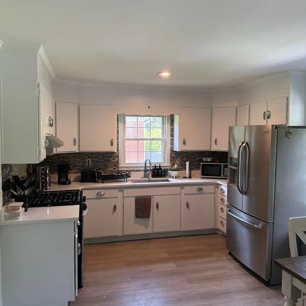 Fully equipped kitchen at Sutter House with stainless steel appliances